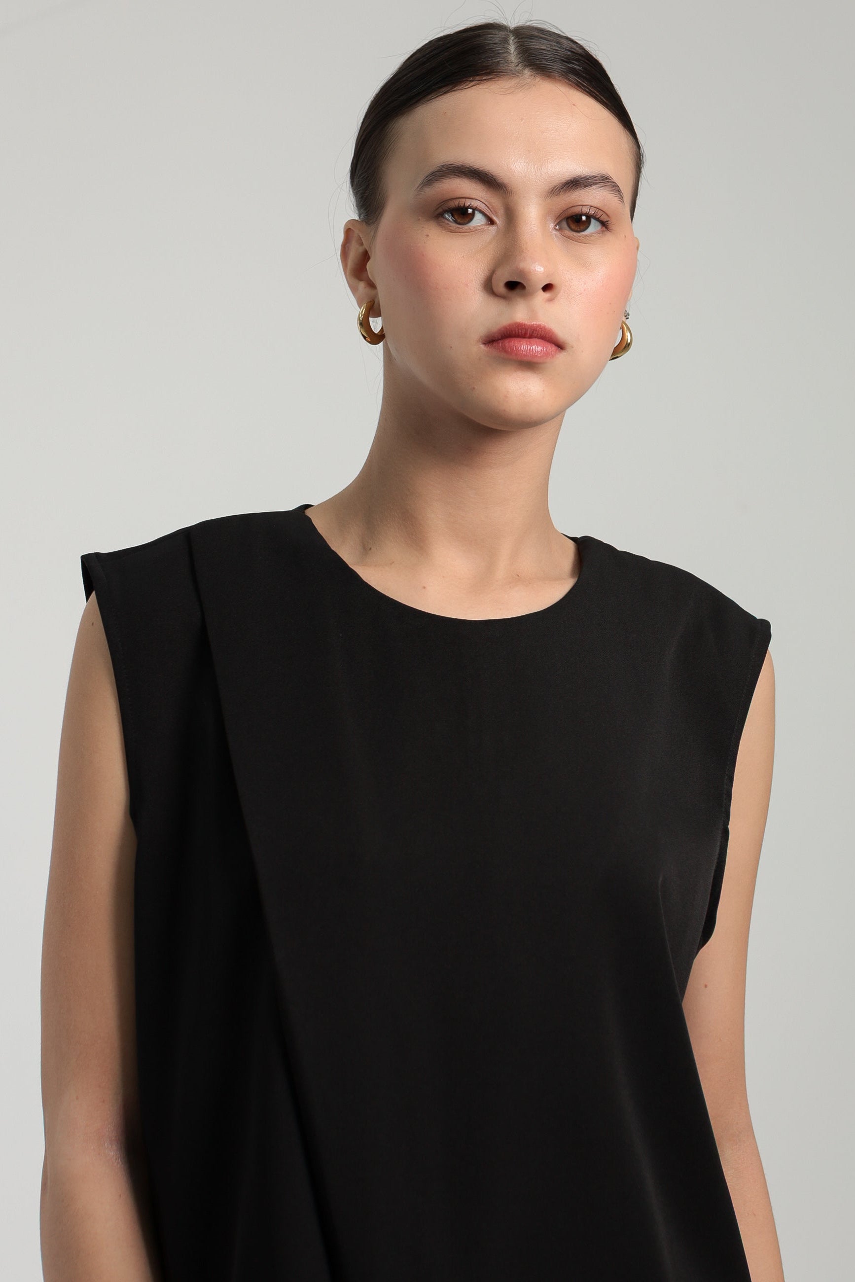 Victoria Assymetric Sleevesee
